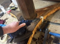 Removing the old veneer from the table base